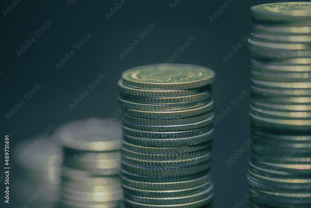Stack of coins for finance investor,Financial investment concept, Forex trading candlestick chart, Cryptocurrency Digital economy. background for invest,inflation 