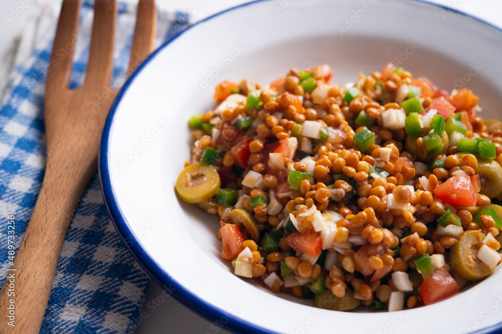 Lentil salad, cod, green pepper and onion. Lentil salad, cod, green pepper and onion.