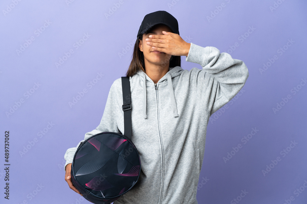 Young sport woman with sport bag covering eyes by hands. Do not want to see something Young sport woman with sport bag covering eyes by hands. Do not want to see something