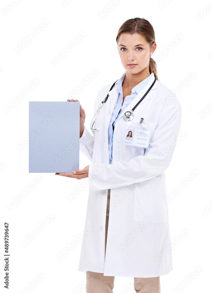 Shes confident about the latest health product. Portrait of beautiful young doctor holding up a blank sign. Shes confident about the latest health product. Portrait of beautiful young doctor holding up a blank sign.