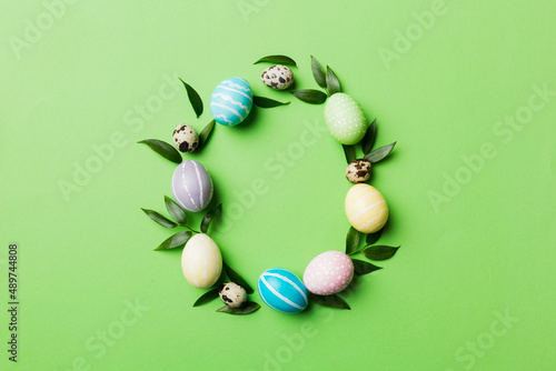 round frame Multi colors Easter eggs on colored background . Pastel color Easter eggs holiday concept with empty space for you design