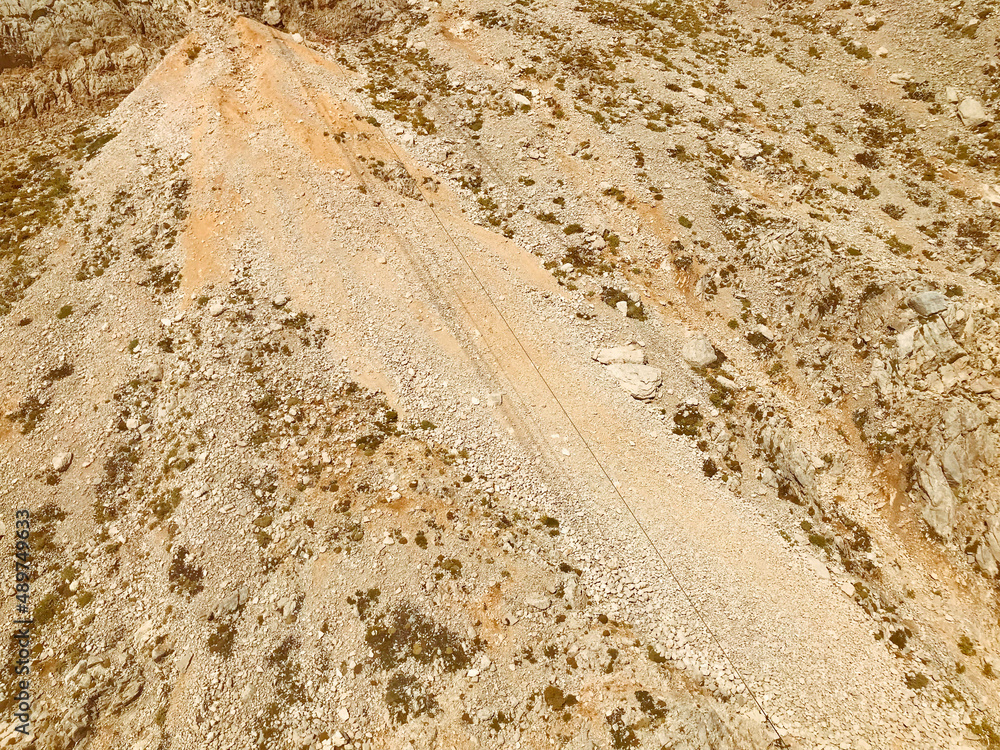 sandy high mountain. high mountain with plants. sand from stones, small granite rocks. vacation in the mountains. relaxation in nature sandy high mountain. high mountain with plants. sand from stones, small granite rocks. vacation in the mountains. relaxation in nature
