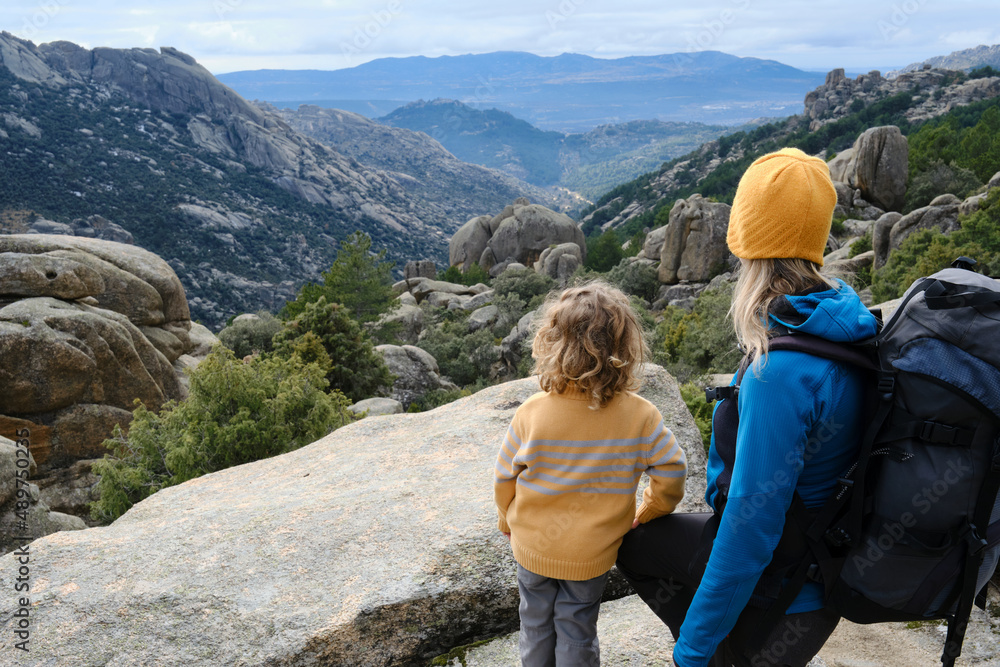Mother and son contemplating nature while hiking Mother and son contemplating nature while hiking
