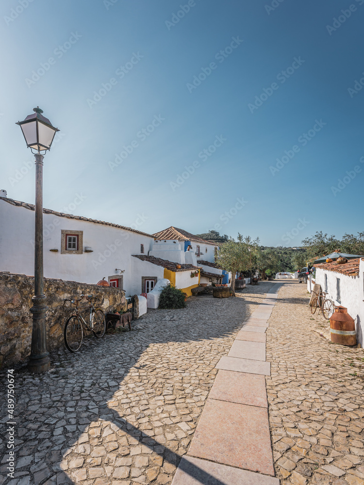 Main Street of small traditional Portuguese village in Lisbon region