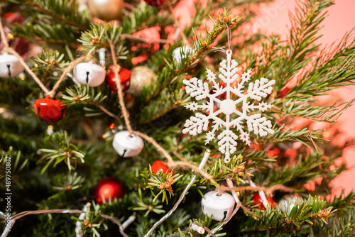 Christmas tree with ornaments, close up photo