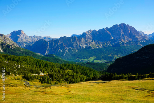 Scenic landscape of Giau Pass or Passo di Giau - 2236m. Mountain pass in the province of Belluno in Italy, Europe. Italian alpine landscape. Travel icon of the Dolomites