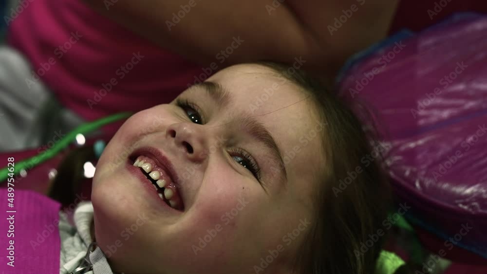Little girl smiling at the dentist's reception, little baby teeth. Little girl smiling at the dentist's reception, little baby teeth.