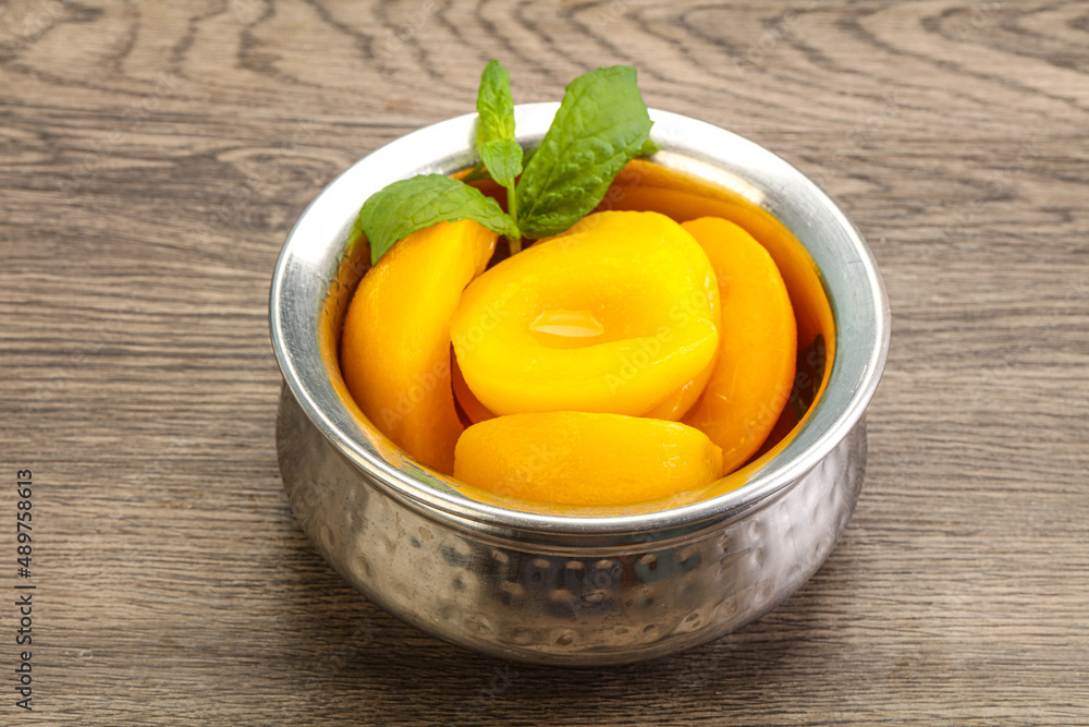 Sweet ripe canned peaches with mint Sweet ripe canned peaches with mint