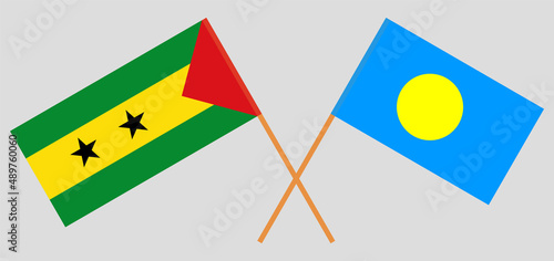 Crossed flags of Sao Tome and Principe and Palau. Official colors. Correct proportion