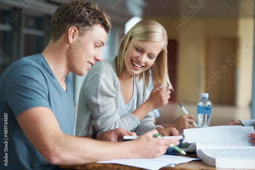 Wow, youre really good at this. A young college student helping a friend learn during a study group.