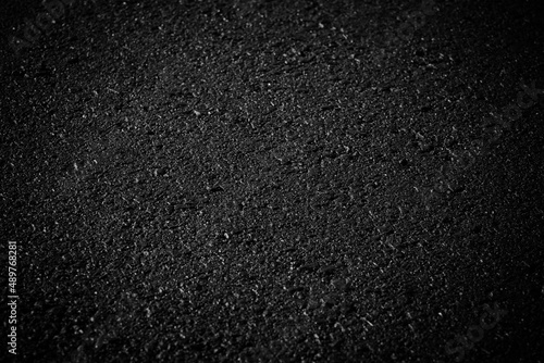 black asphalt texture. asphalt road. stone asphalt texture background black granite gravel © ooddysmile