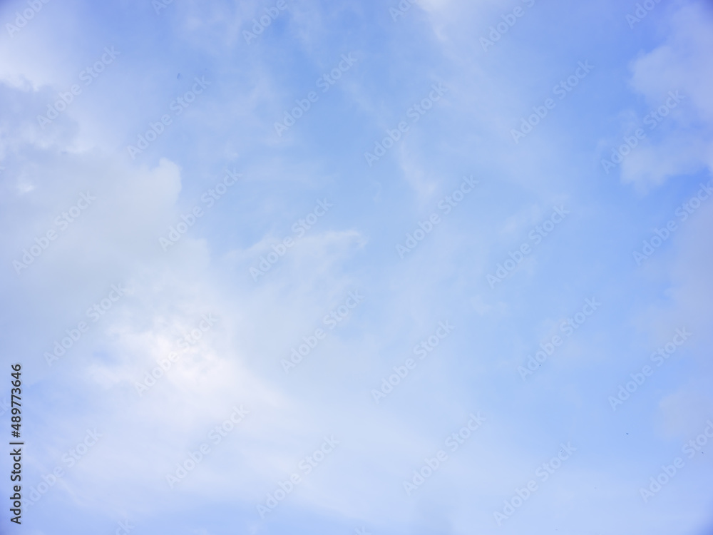 Natural sky background of blue cloudy sky