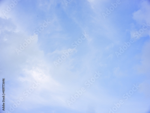 Natural sky background of blue cloudy sky