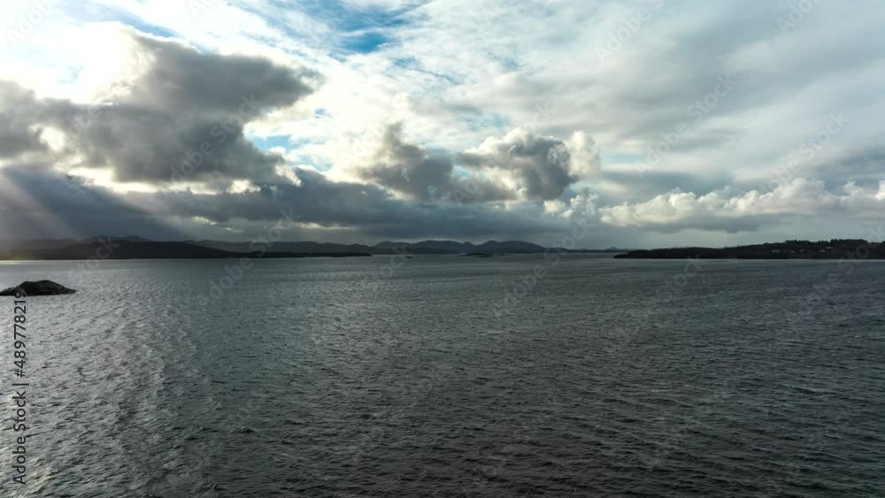 Clouds Moving In Sunny Sky Over Fjord In Norway. hyperlapse Clouds Moving In Sunny Sky Over Fjord In Norway. hyperlapse
