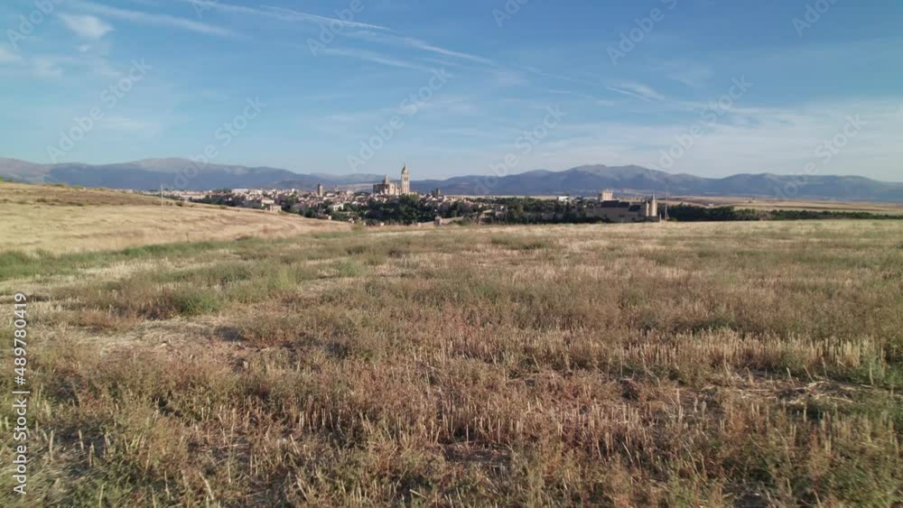 Historic cultural city Segovia, Spain at the distance. Segovia Cathedral and Alcazar Castle Historic cultural city Segovia, Spain at the distance. Segovia Cathedral and Alcazar Castle