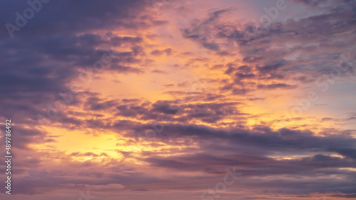 amazing clouds at sunset with orange and blue sky