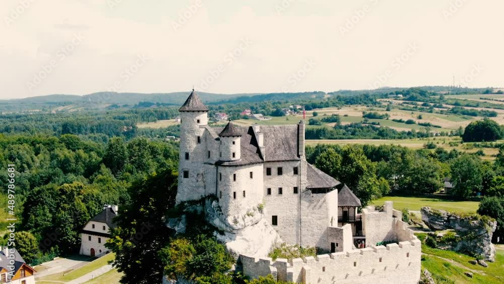 Morning aerial view on the medieval royal castle Bobolice. Poland. High quality 4k footage. Dolly zoom Morning aerial view on the medieval royal castle Bobolice. Poland. High quality 4k footage. Dolly zoom