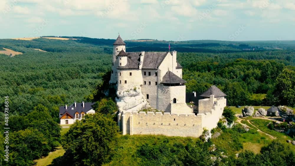 Morning aerial view on the medieval royal castle Bobolice. Poland. High quality 4k footage Morning aerial view on the medieval royal castle Bobolice. Poland. High quality 4k footage