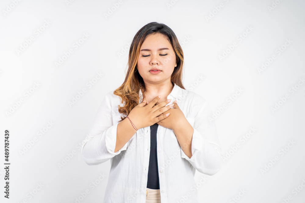 asian woman with cute hand gesture making v shape on finger asian woman with cute hand gesture making v shape on finger