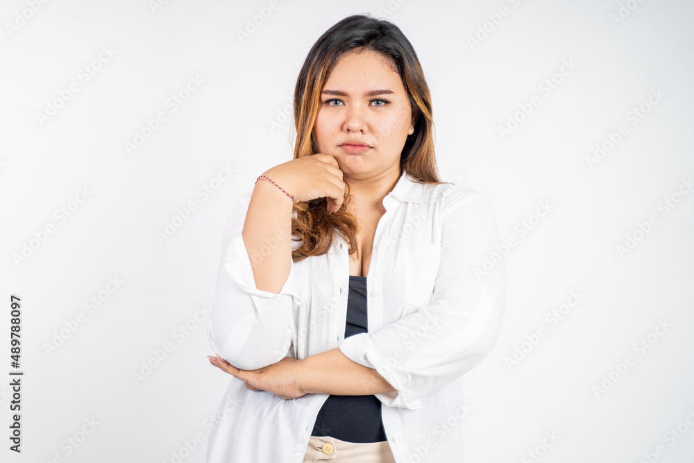 sad portrait of young asian woman over isolated background sad portrait of young asian woman over isolated background