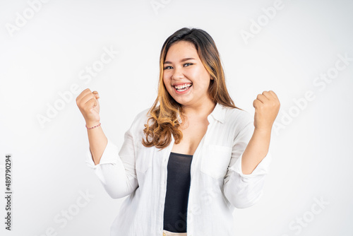 woman with open palm hands while celebrating success