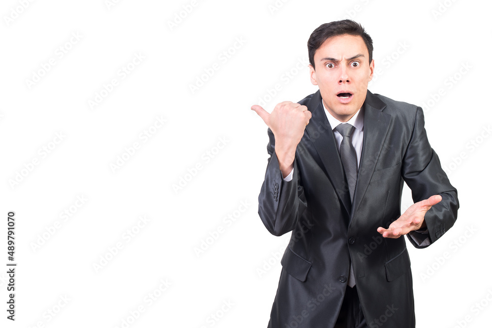 Shocked man pointing aside with surprise and astonishment Shocked man pointing aside with surprise and astonishment