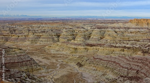 the incredibly-colored badlands and Kutz Canyon of the Angel Peak Scenic Area near Bloomfield, New Mexico, at dusk on a winter day 