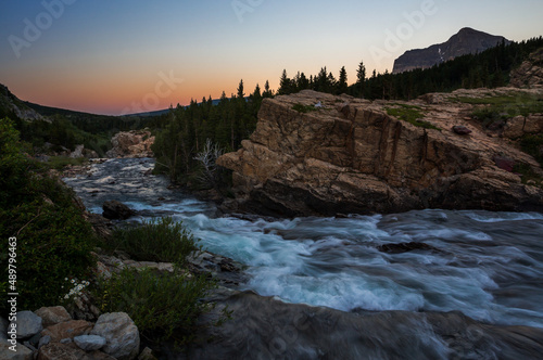 Swiftcurrent creek in Glacier National Park, Montana, USA, in summer dawn