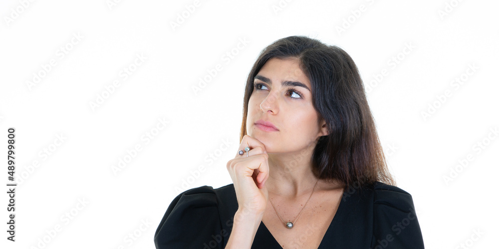 beautiful woman looking side hand on chin on the left beautiful woman looking side hand on chin on the left