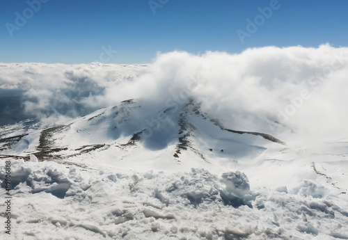 Fotografía Mount Hermon in the Golan Heights covered with snow and clouds