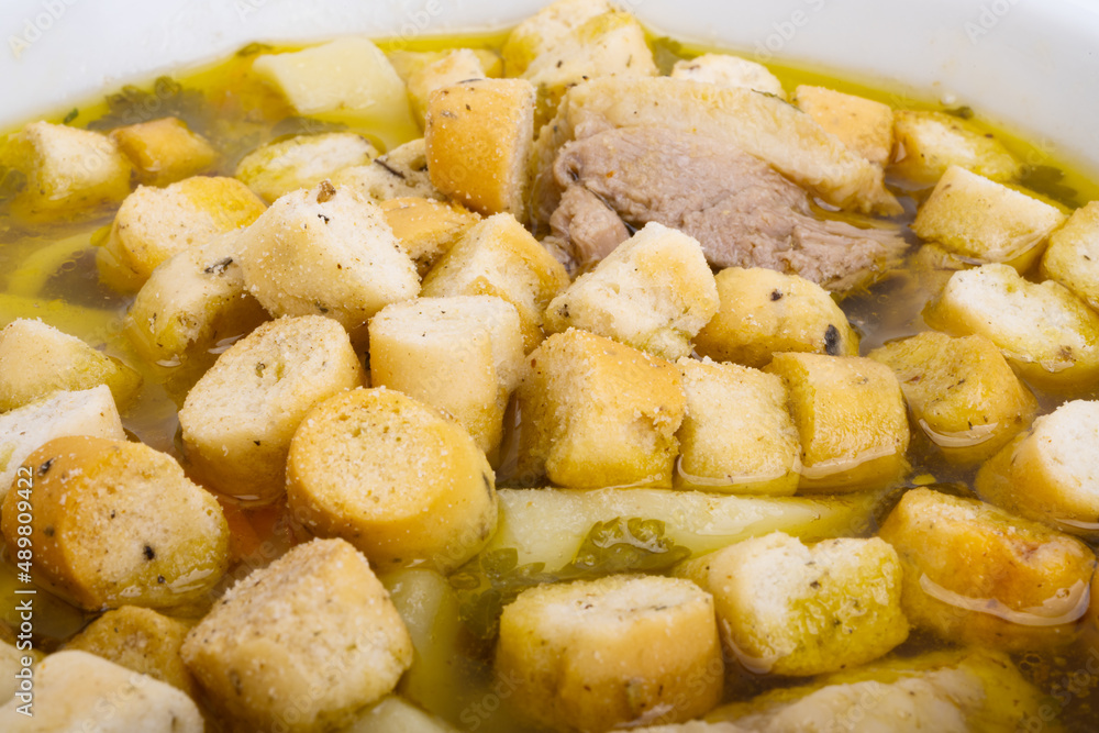 chicken broth with croutons isolated chicken broth with croutons isolated