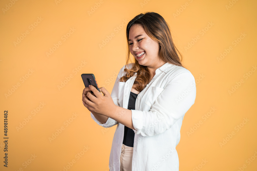 beautiful asian woman using mobile cell phone typing text beautiful asian woman using mobile cell phone typing text