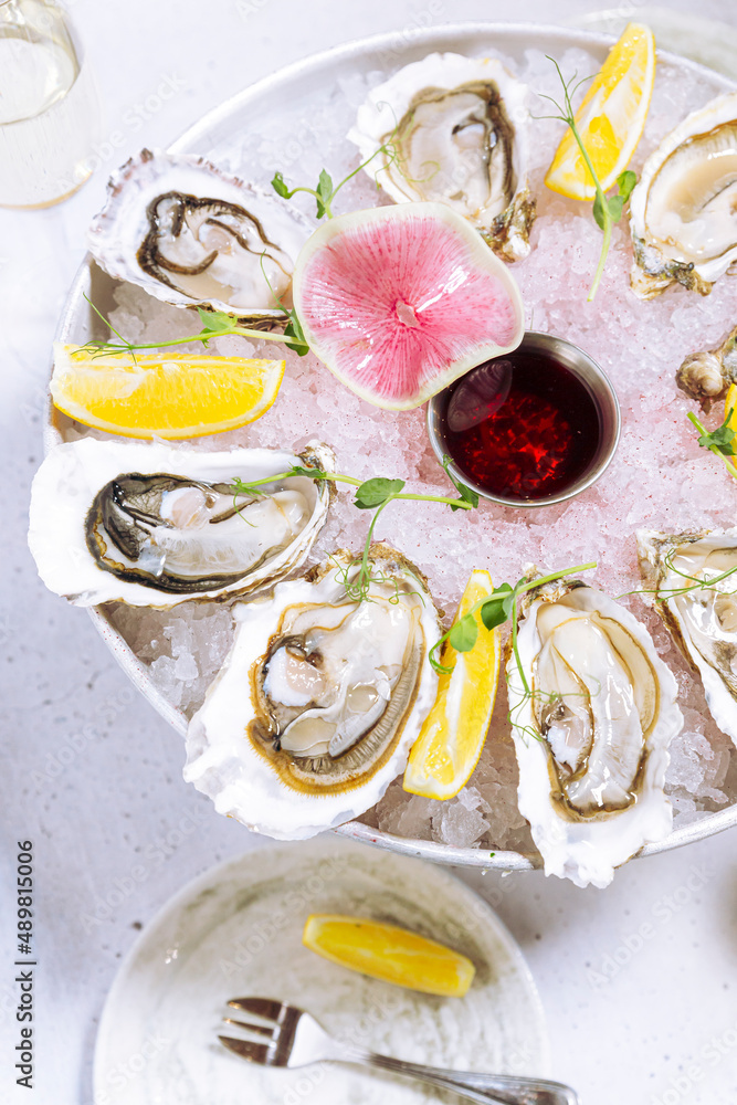 Fresh ready-to-eat oysters on cakestand Fresh ready-to-eat oysters on cakestand