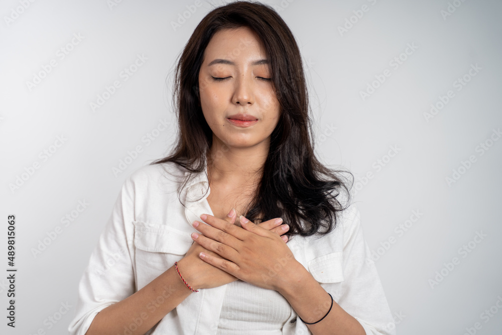 asian woman with cute hand gesture making v shape on finger asian woman with cute hand gesture making v shape on finger