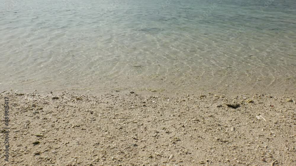 OKINAWA, JAPAN : View of clear sea (beach, ocean) in Okinawa island. Sunny summer daytime shot. Clean water, ecology, environment and earth or holiday, vacation and relaxing resort concept video. OKINAWA, JAPAN : View of clear sea (beach, ocean) in Okinawa island. Sunny summer daytime shot. Clean water, ecology, environment and earth or holiday, vacation and relaxing resort concept video.