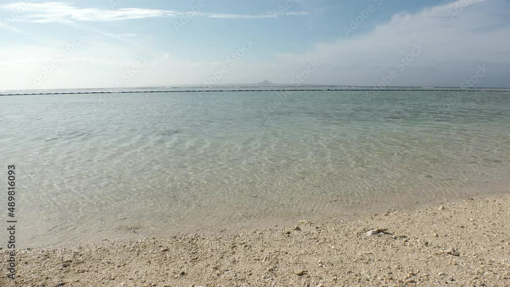 OKINAWA, JAPAN : View of clear sea (beach, ocean) in Okinawa island. Sunny summer daytime shot. Clean water, ecology, environment and earth or holiday, vacation and relaxing resort concept video. OKINAWA, JAPAN : View of clear sea (beach, ocean) in Okinawa island. Sunny summer daytime shot. Clean water, ecology, environment and earth or holiday, vacation and relaxing resort concept video.