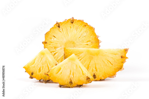 Fresh pineapple (Ananas comosus)  with slices isolated on white background