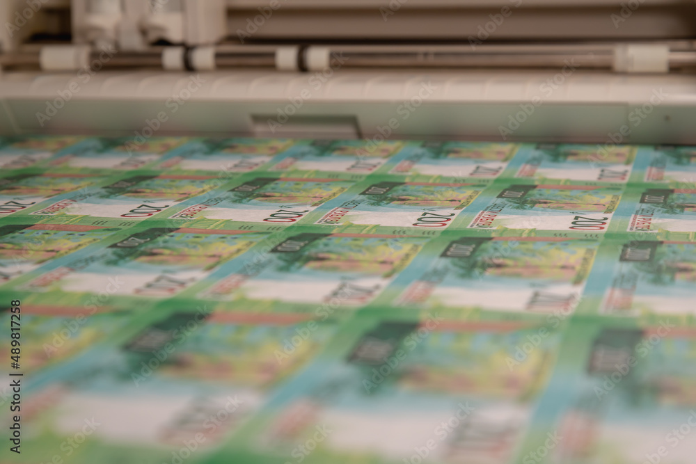 Banknotes, printing and cutting sheets.