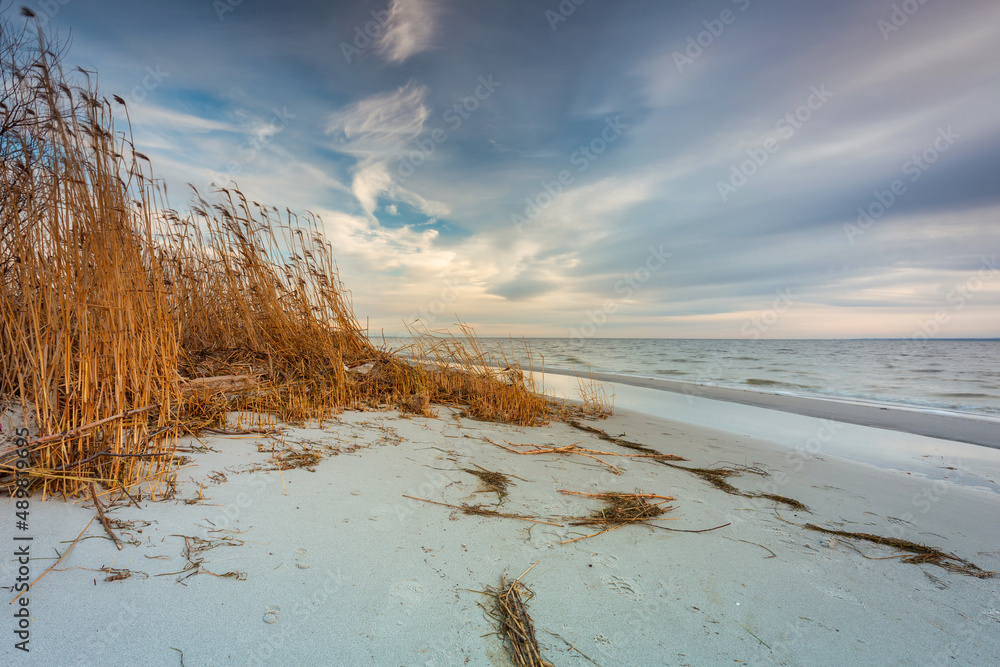 Beautiful beach of the Baltic Sea at sunset in Kuznica, Hel Peninsula. Poland Beautiful beach of the Baltic Sea at sunset in Kuznica, Hel Peninsula. Poland