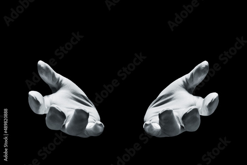 Obraz na plátně Magician hands isolated on black background