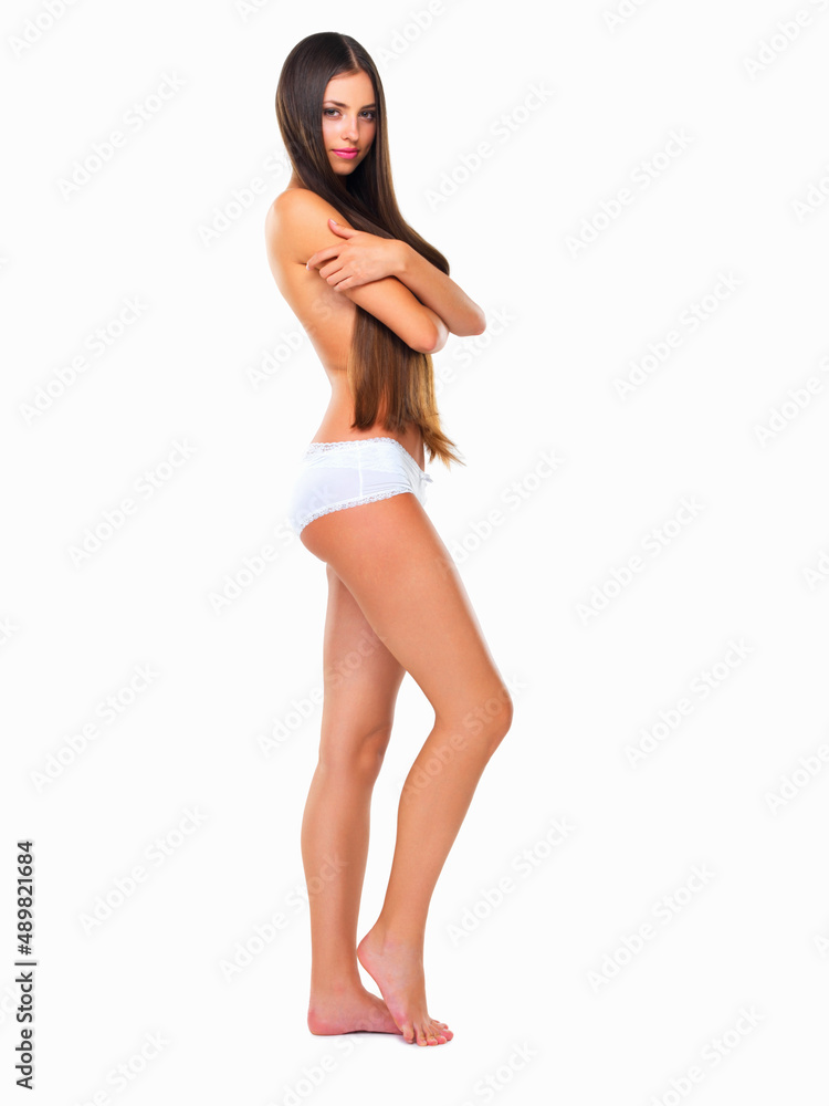 My hair is an extension of me. Studio portrait of a young topless woman with long hair posing against a white background. My hair is an extension of me. Studio portrait of a young topless woman with long hair posing against a white background.