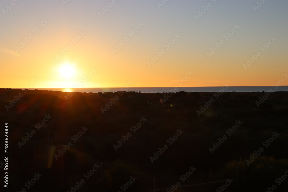 Sunset over Shark Bay near the town of Denham, Western Australia. Sunset over Shark Bay near the town of Denham, Western Australia.