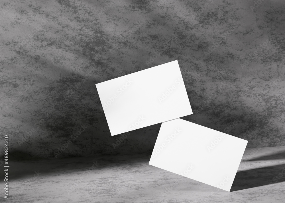Blank white business cards on rough concrete surface. Mockup for branding identity. Two cards, to show both sides. Template for graphic designers. Free space, copy space. 3D rendering. Blank white business cards on rough concrete surface. Mockup for branding identity. Two cards, to show both sides. Template for graphic designers. Free space, copy space. 3D rendering.