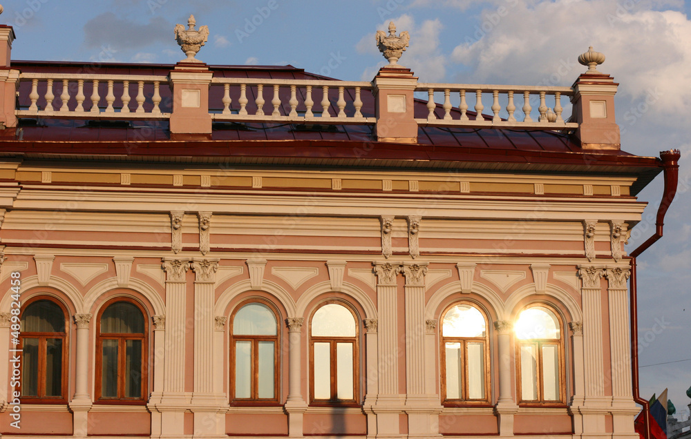 Kazan, Russia - 12 July 2021 - Fragment of the facade of a building. Streets of Kazan, panoramic view of the city on a summer day, buildings and architecture of the city.