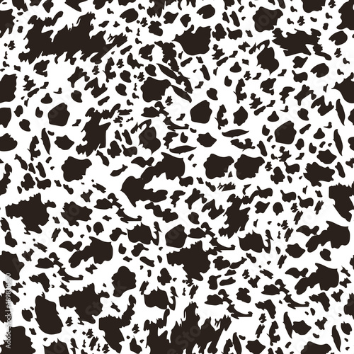 Seamless pattern with animal print dolmatian. Spots of black. Suitable for printing and textiles.