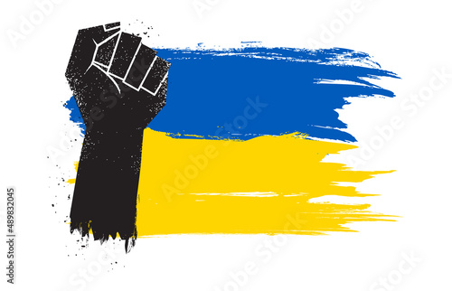 Fist raise up with paint brush of Ukraine flag. Vector
