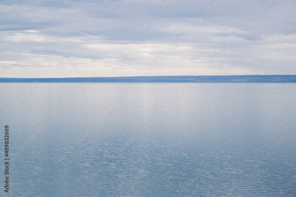 Landscape of the river Volga. Shore on the opposite side. Spacious river at autumn Landscape of the river Volga. Shore on the opposite side. Spacious river at autumn