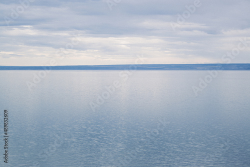 Landscape of the river Volga. Shore on the opposite side. Spacious river at autumn