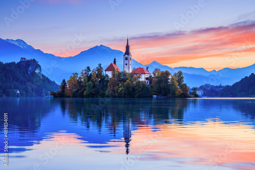 Lake Bled  Slovenia. Sunrise at Lake Bled with famous Bled Island and historic Bled Castle in the background.