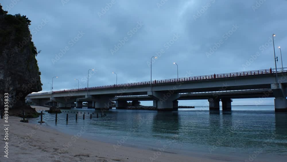 NAHA, OKINAWA, JAPAN - AUGUST 2021 : View of Naminoue beach (Ocean or sea) at night. Wide view, real time shot. Summer holiday, vacation and resort concept video. NAHA, OKINAWA, JAPAN - AUGUST 2021 : View of Naminoue beach (Ocean or sea) at night. Wide view, real time shot. Summer holiday, vacation and resort concept video.